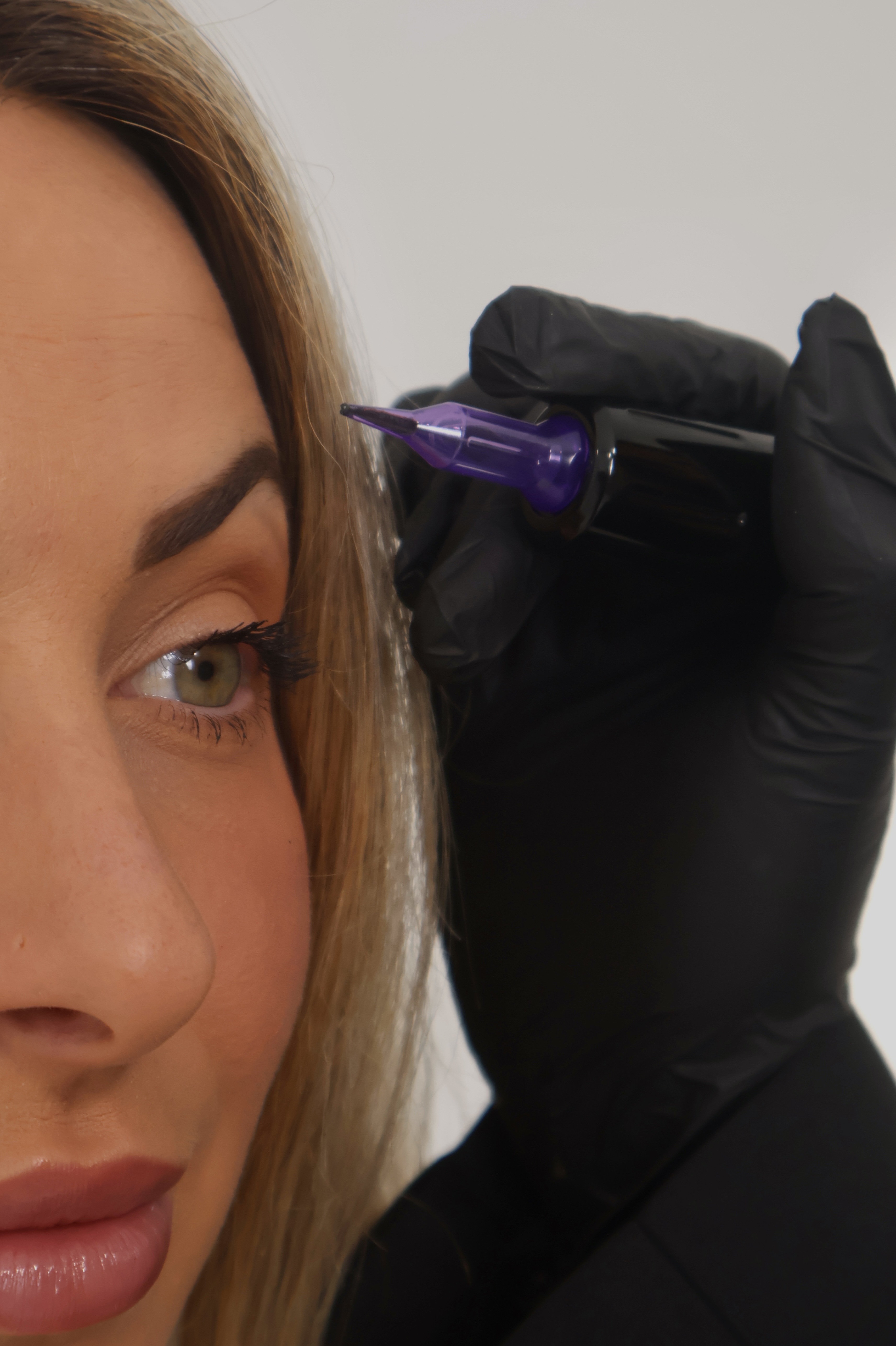 Bec working at the brow during an ombré tattoo appointment at Bhava Beauty